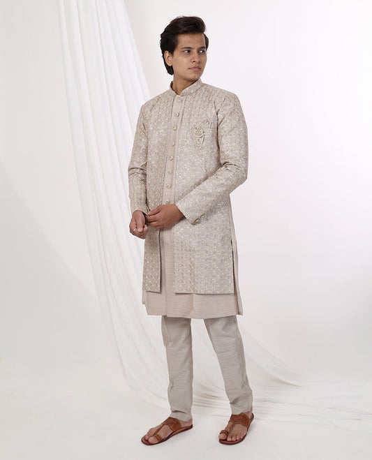 Sandal floral thread embroidery with sequins work mandarin collar & full-sleeve long raw silk kurta