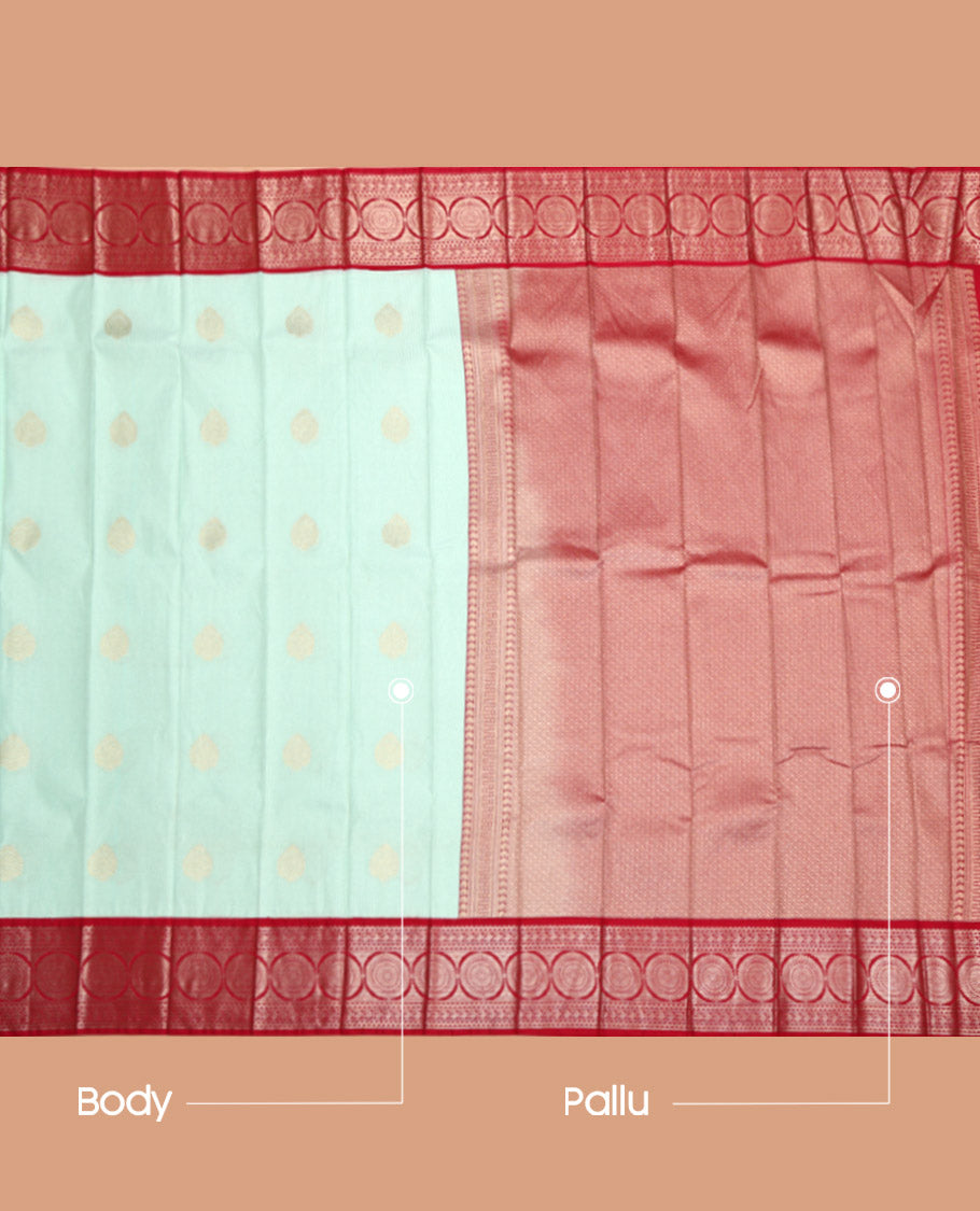Turquoise Budget Silk Saree, Embellished with Zari Buttas All Over Its Body, Complemented by a Contrast Traditional Zari Design Border, Grand Jaal Pallu, and Paired with a Contrast Blouse