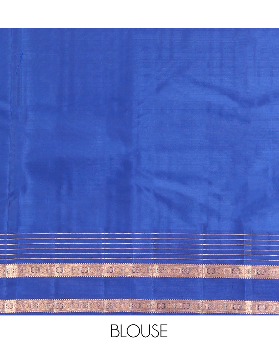Grey Vasundhara Lite Silk Mix Saree, Ornamented with Zari Buttas, a Contrast Rettai Pettu Border of Rekku, Muthu, Diamond, and Manga Designs, Manga Pallu, and a Contrast Blouse