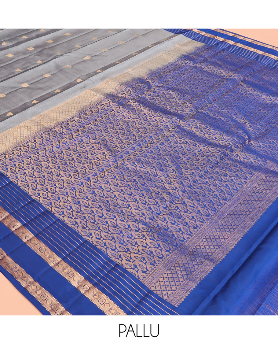 Grey Vasundhara Lite Silk Mix Saree, Ornamented with Zari Buttas, a Contrast Rettai Pettu Border of Rekku, Muthu, Diamond, and Manga Designs, Manga Pallu, and a Contrast Blouse