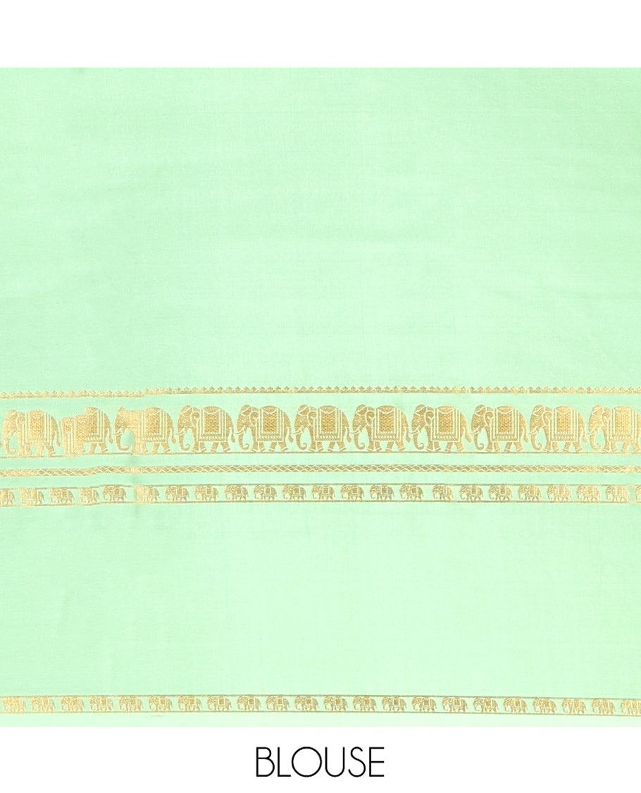 Green Plain Mysore Silk Saree, Highlighted by Traditional Zari Border of Elephant Motifs, Subtly Zari Striped Pallu, and Paired with a Matching Blouse