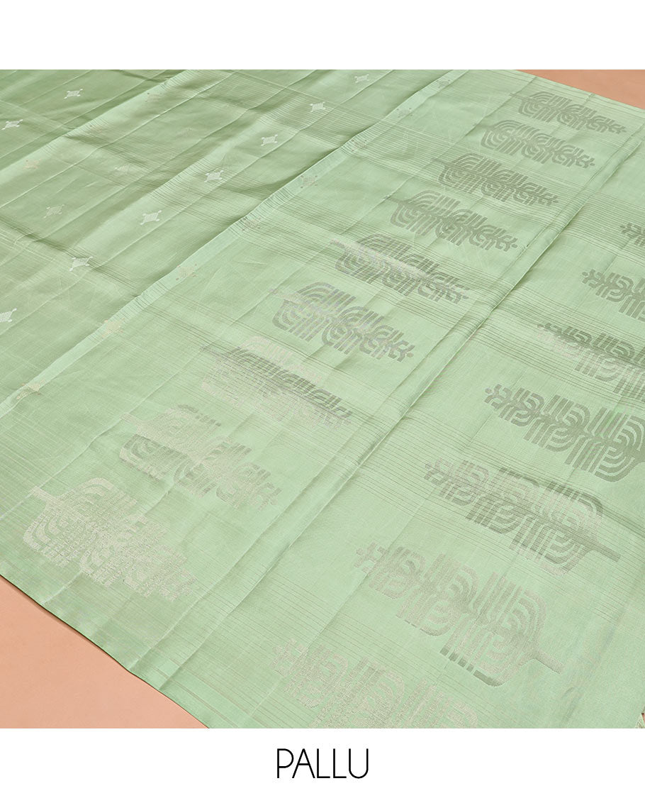 Borderless Green Mayuri Soft Silk Saree, Woven with Buttas All Over Its Body, Sparsely Sparkled Pallu, and Paired with a Matching Blouse