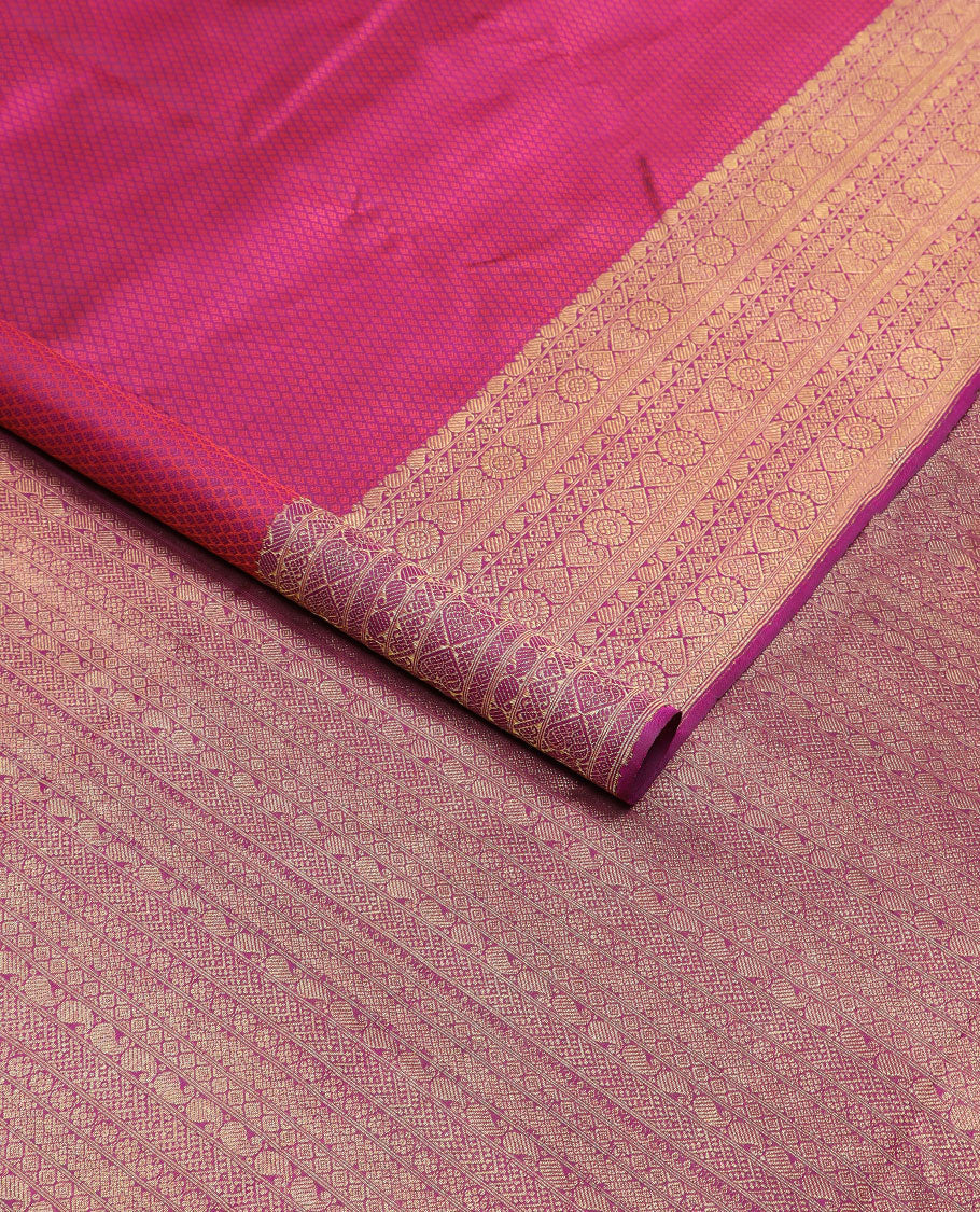 Magenta jaal design silk saree with self zari border of manga, poo chakram design & floral design pallu