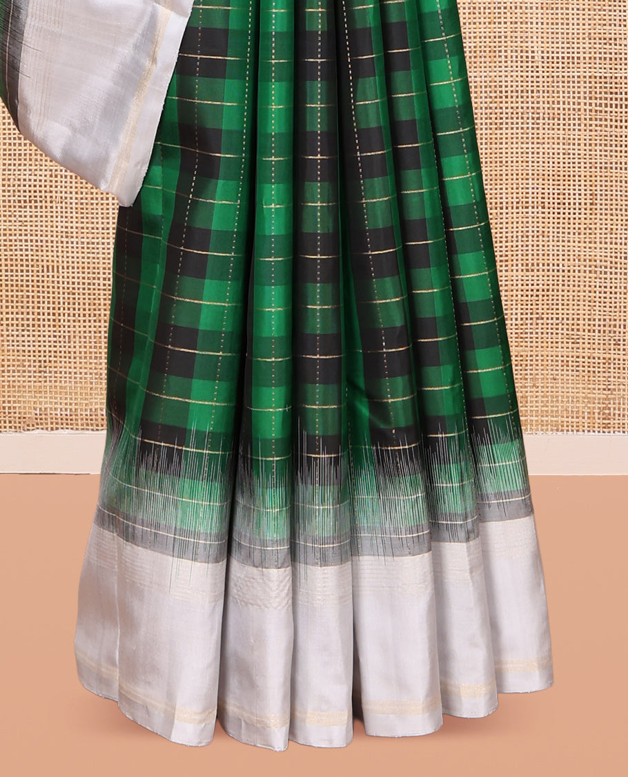 Green Checked Kanchipuram Silk Saree, Complemented by a Contrast Border of Zari Stripes, Zari Checked Pallu, and a Contrast Blouse