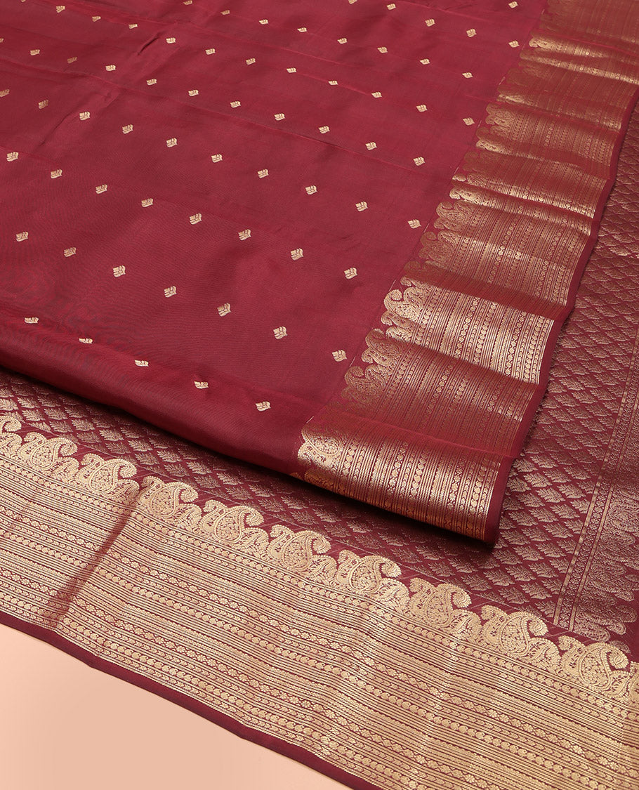 Maroon Vasundhara Lite Silk Mix Saree, Prettified with Zari Buttas, Highlighted by a Zari Border of Manga, and Geometric Designs, Pallu Adorned with Jaal Designs, and Paired with a Matching Blouse