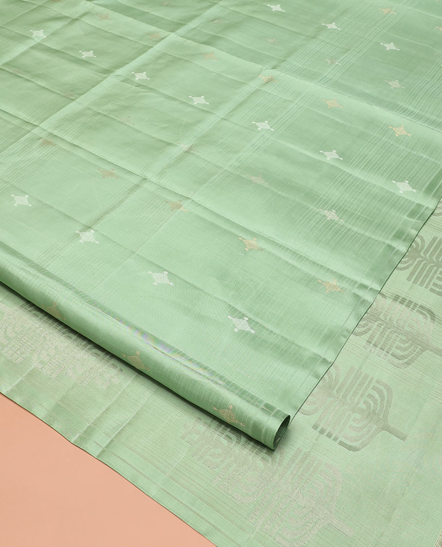 Borderless Green Mayuri Soft Silk Saree, Woven with Buttas All Over Its Body, Sparsely Sparkled Pallu, and Paired with a Matching Blouse