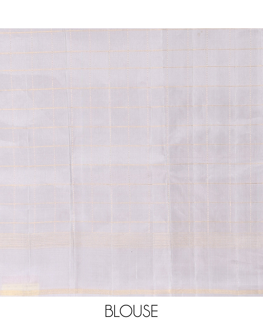 Green Checked Kanchipuram Silk Saree, Complemented by a Contrast Border of Zari Stripes, Zari Checked Pallu, and a Contrast Blouse