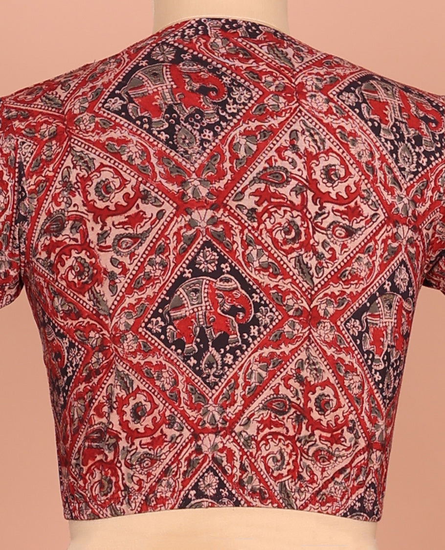 Red Cotton Readymade Blouse Adorned with All-Over Floral and Elephant Motifs Print, Featuring a Front Leaf-Neck, a Closed Back Neck, and Elbow Sleeves