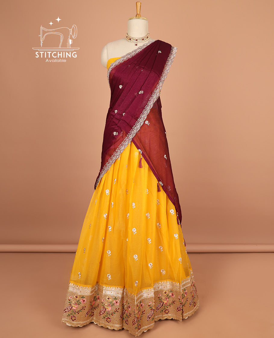 Yellow floral motifs embroidery half saree with contrast with floral vine embroidery border , embridery blouse & floral embroidery scallop border dhavani