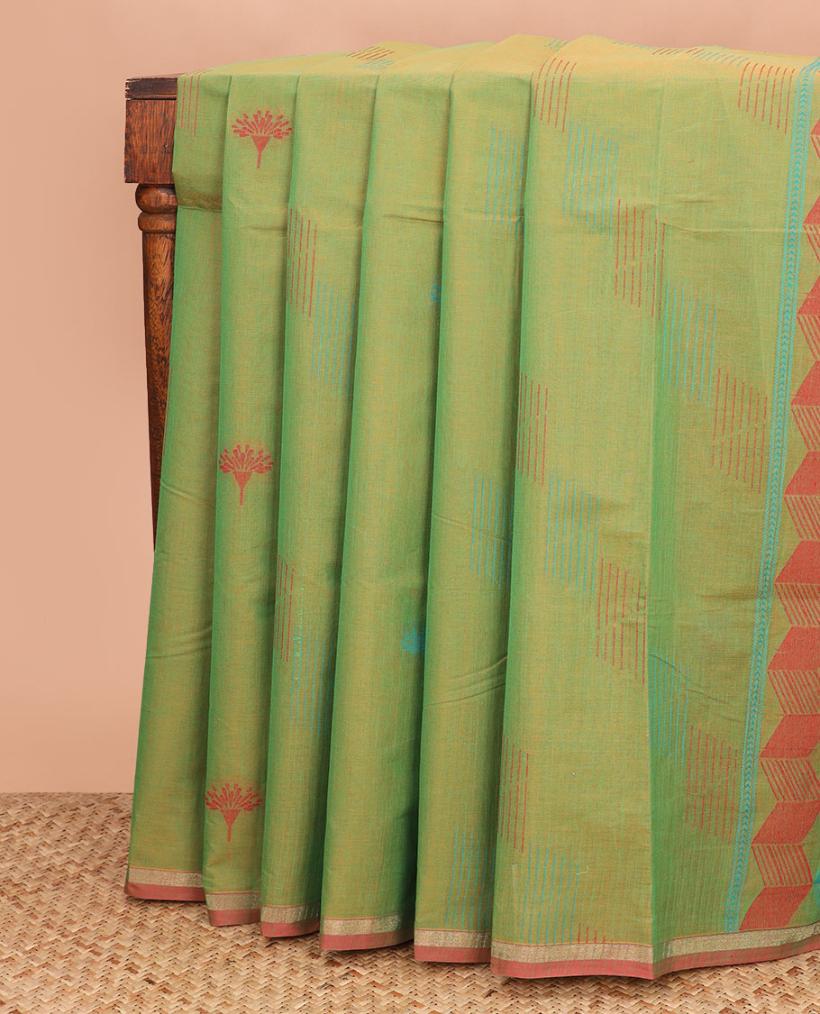 Green buttas coimbatore cotton saree, contrast piping border, and pallu of geometric patterns