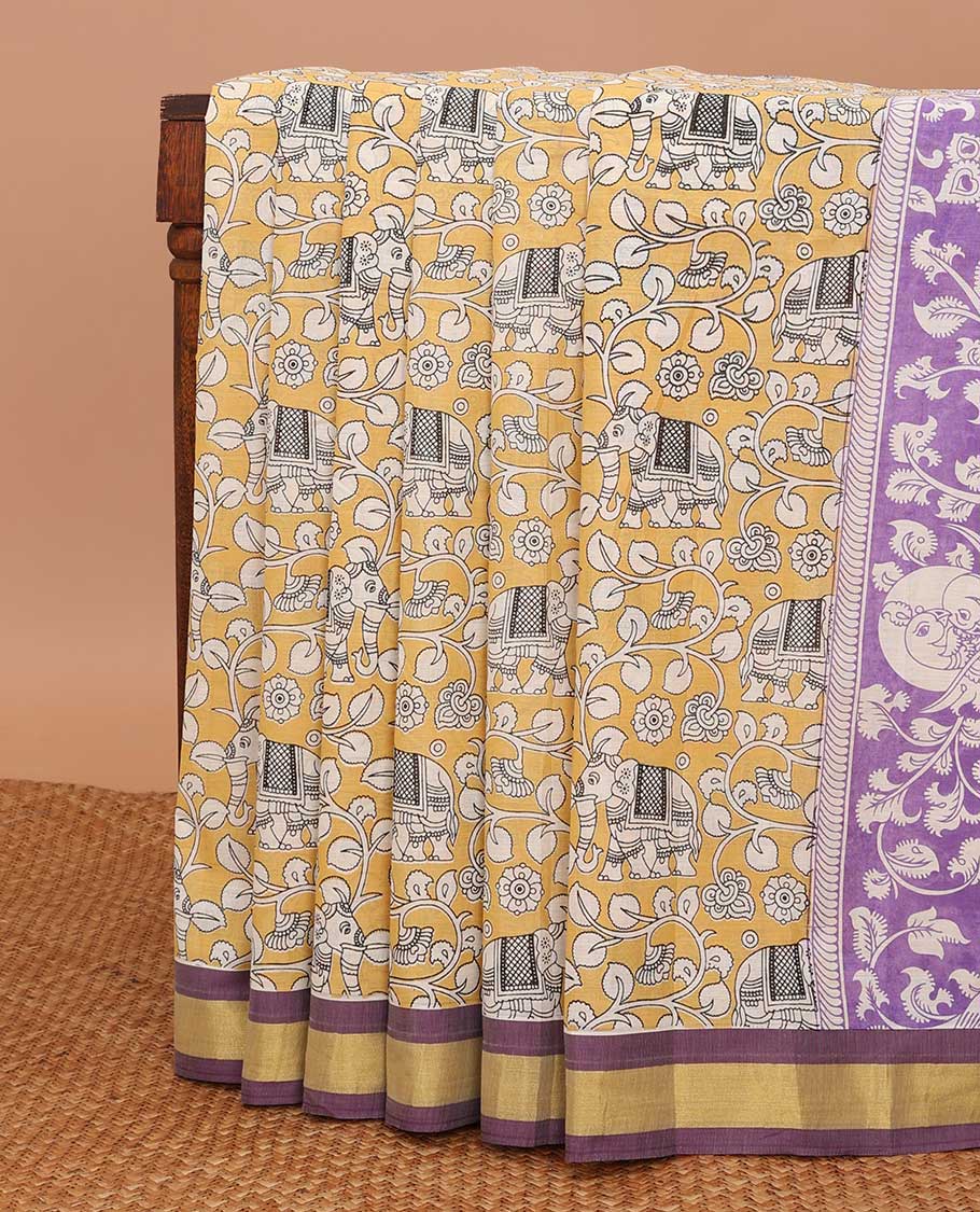 Yellow kalamkari-style floral vine & elephant printed chirala cotton saree, contrast plain border & pallu of floral & peacock print