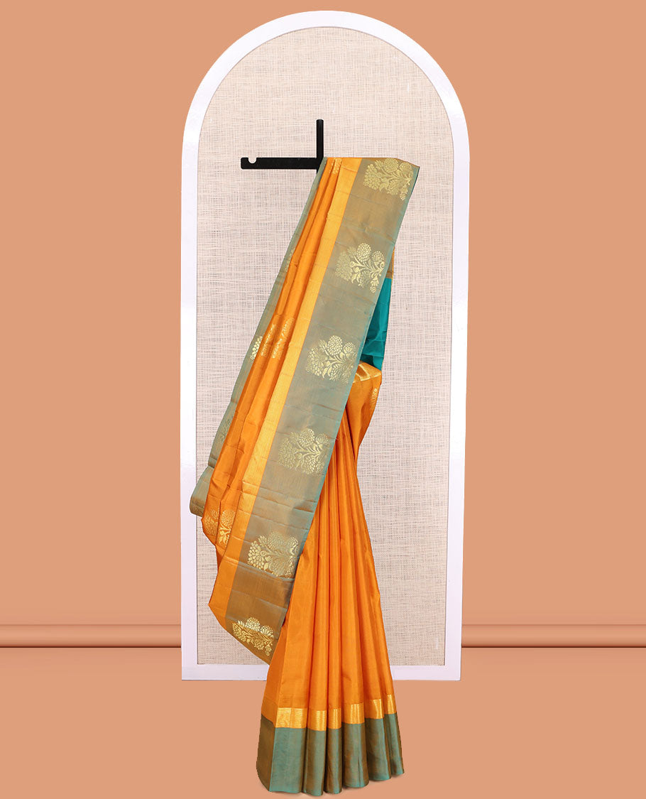 Orange Kanchipuram Silk Saree, Woven with Floral Zari Buttas, a Contrast Floral Zari Design Border, Floral Design Pallu, and a Contrast Blouse