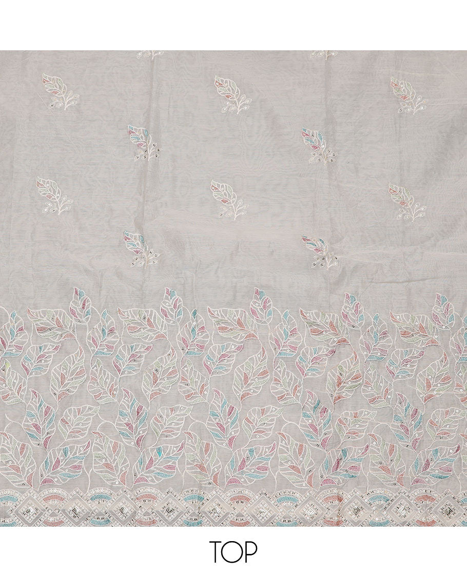 Cream material churidar set, leaf motifs embroidered top, plain bottom, and a sequins embroidered dupatta