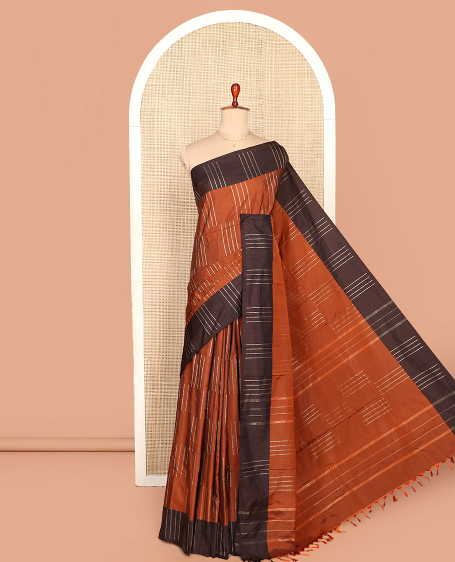 Brown Aarani Silk Saree, Subtly Enriched with Zari Stripes All Over Its Body, Complemented by a Contrast Zari Stripes Border, Pallu of Stripes, and Paired with a Matching Blouse