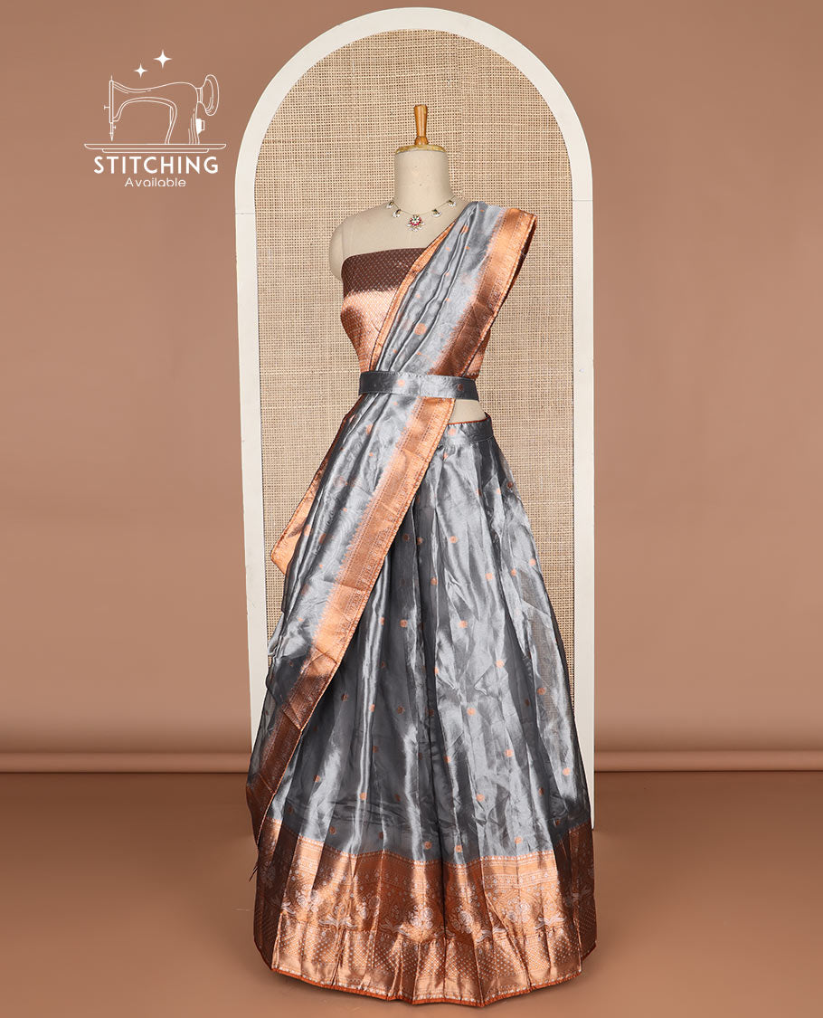 Grey buttas tissue half saree with contrast zari design border, checked zari design blouse & floral design dhavani
