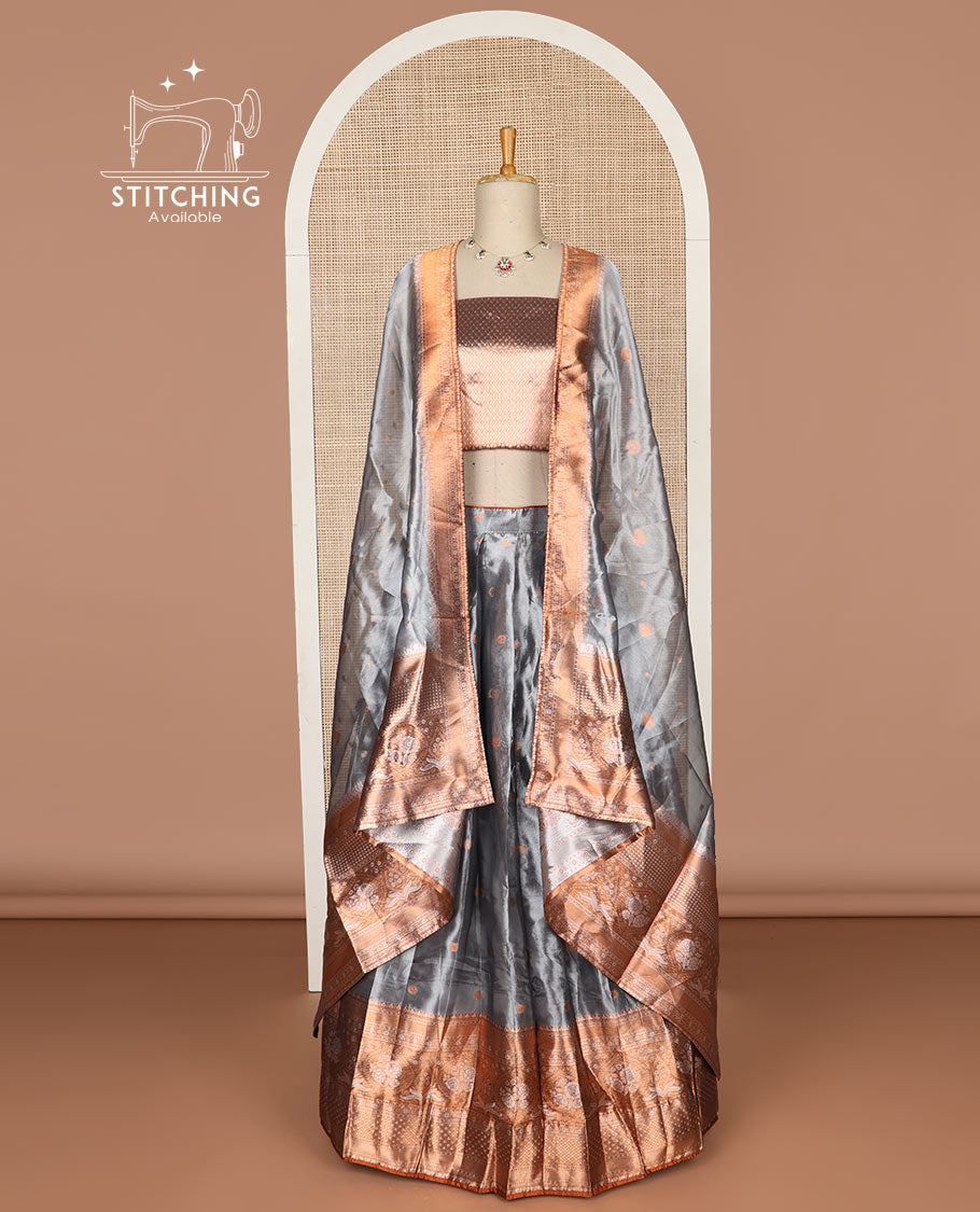 Grey buttas tissue half saree with contrast zari design border, checked zari design blouse & floral design dhavani