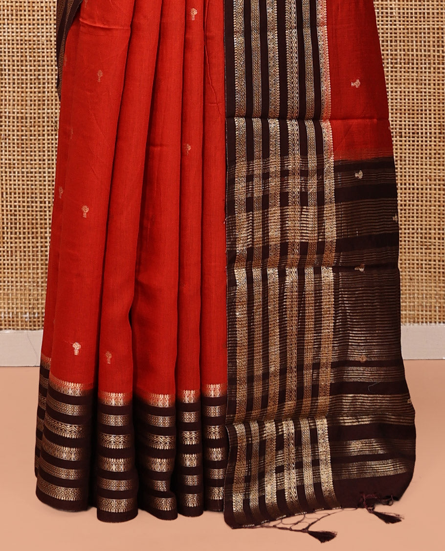 Rust Assam Silk Saree, Detailed with Zari Buttas, Complemented by a Contrast Traditional Zari Border, Striped Pallu, and a Contrast Blouse