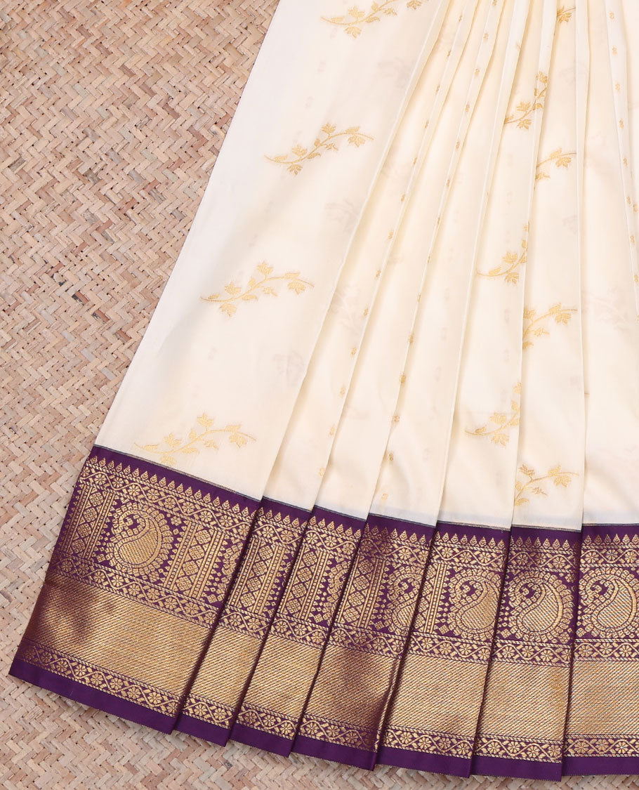Cream Budget Silk Saree, Showcasing Zari Buttas All Over Its Body, Complemented by a Contrast Traditional Zari Design Border of Paisleys, Pallu Features Paisley Designs, and Paired with a Contrast Blouse