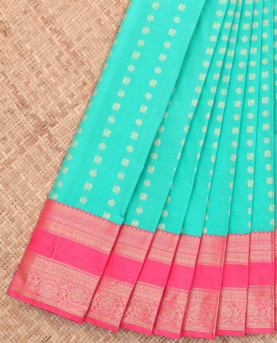 Turquoise Budget Silk Saree, Ornamented with Zari Buttas All Over Its Body, Complemented by a Contrast Traditional Zari Design Rettai Pettu Border, Grand Pallu, and Paired with a Contrast Blouse