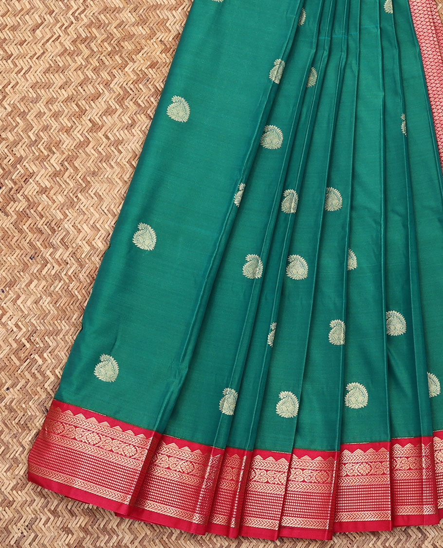 Green Budget Silk Saree, Beautifully Bedecked with Paisley Buttas All Over Its Body, Complemented by a Contrast Traditional Zari Design Border, Sparsely Woven Jaal Pallu, and Paired with a Contrast Blouse
