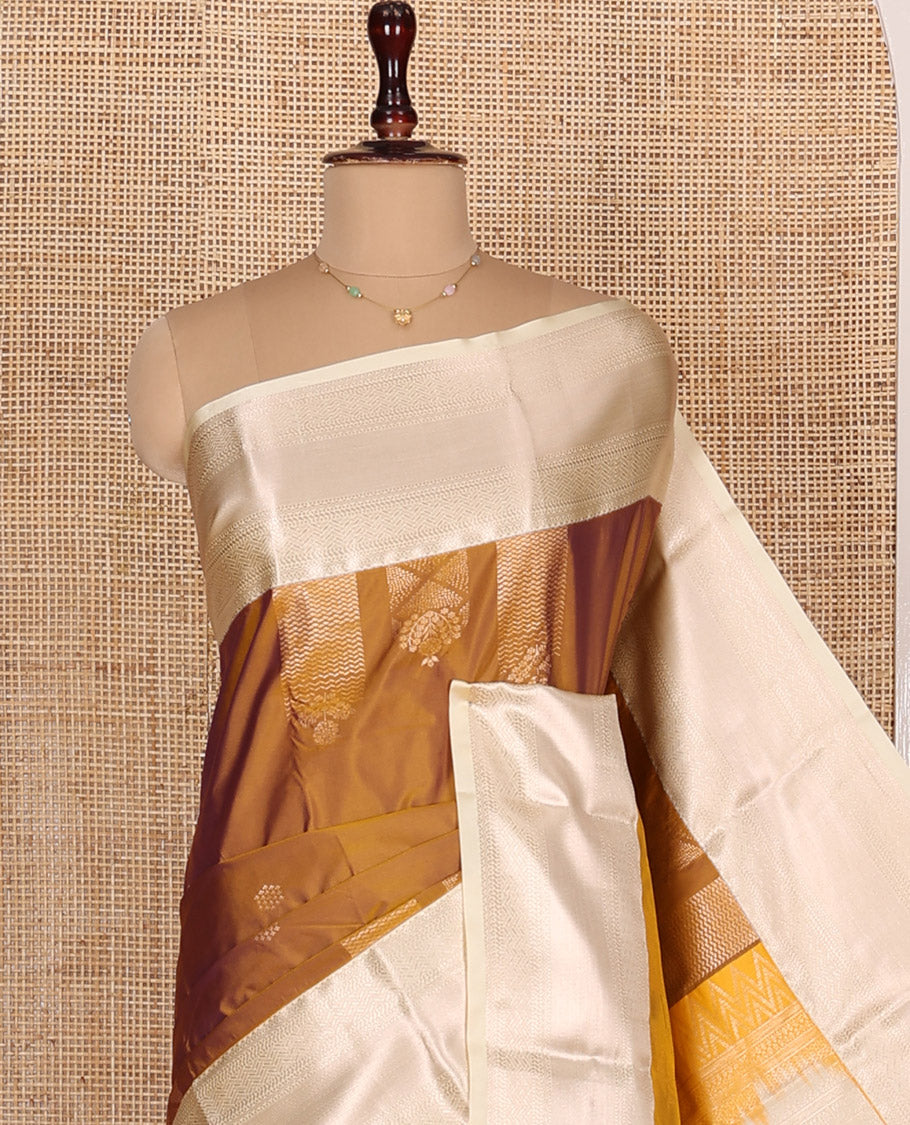 Honey Color Budget Silk Saree, Enriched with Zari Designs All Over Its Body, Complemented by a Contrast Border of Traditional Designs Woven in Zari, Pallu Detailed with Chevron Designs, and Paired with a Contrast Blouse