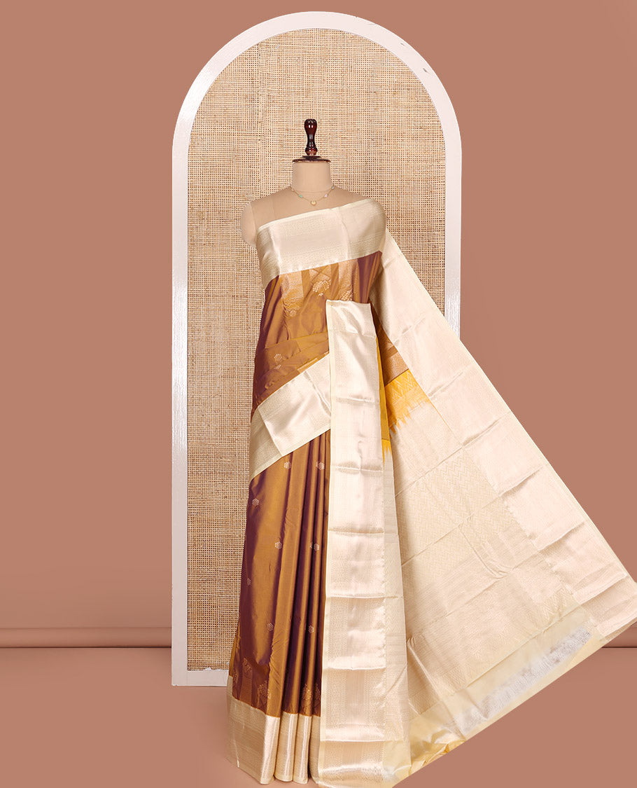 Honey Color Budget Silk Saree, Enriched with Zari Designs All Over Its Body, Complemented by a Contrast Border of Traditional Designs Woven in Zari, Pallu Detailed with Chevron Designs, and Paired with a Contrast Blouse
