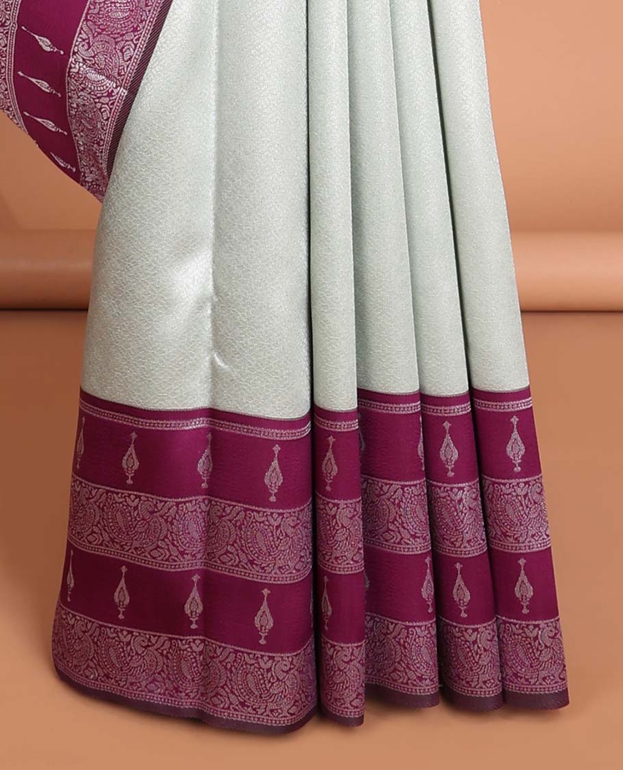 Mint green floral jacquard litchi silk saree with contrast zari design border & checked floral design pallu