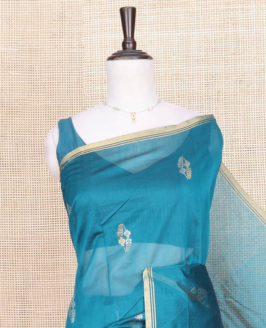Blue Chanderi Cotton Saree, Decorated with Zari Buttas All Over Its Body, Highlighted by a Zari Piping Border, Pallu Steeped with Zari Buttas, and Paired with a Matching Blouse