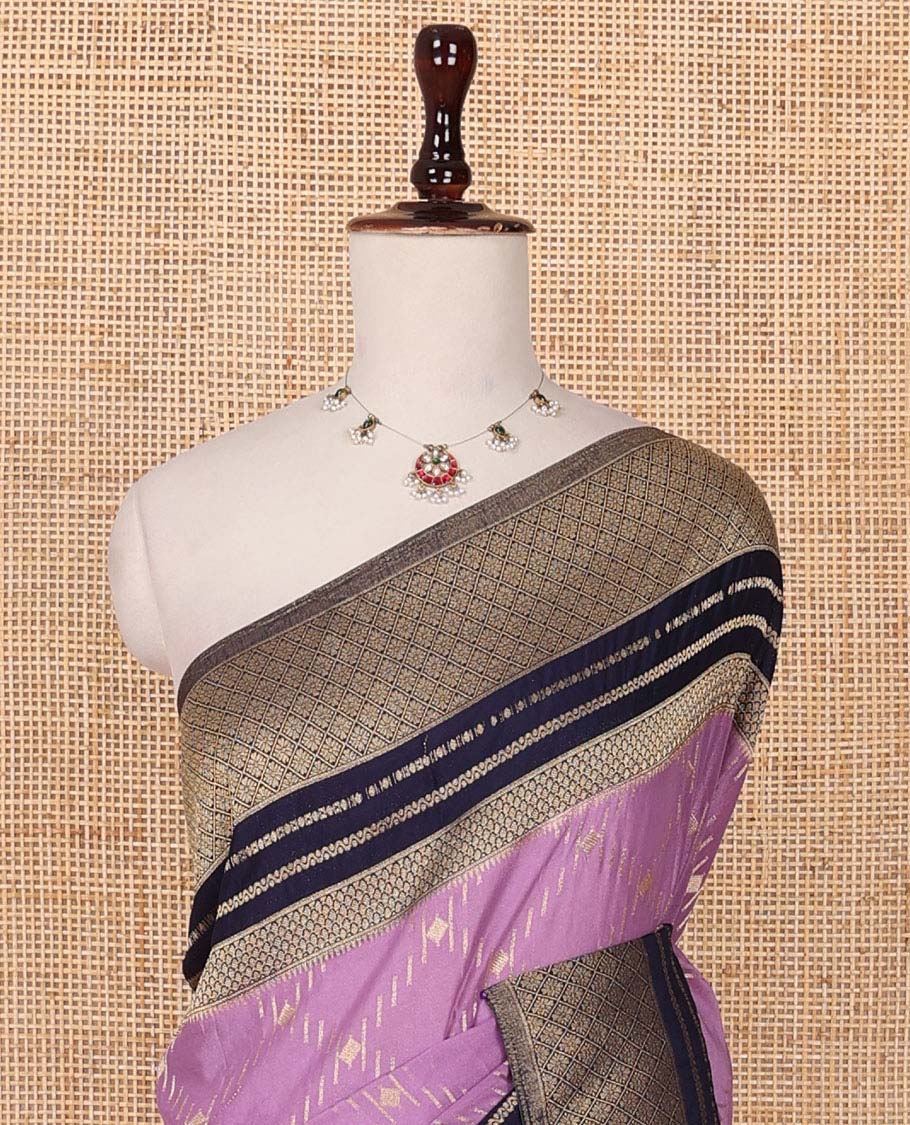 Purple jaal patterned fancy crepe saree, contrast traditional zari border & zari design pallu
