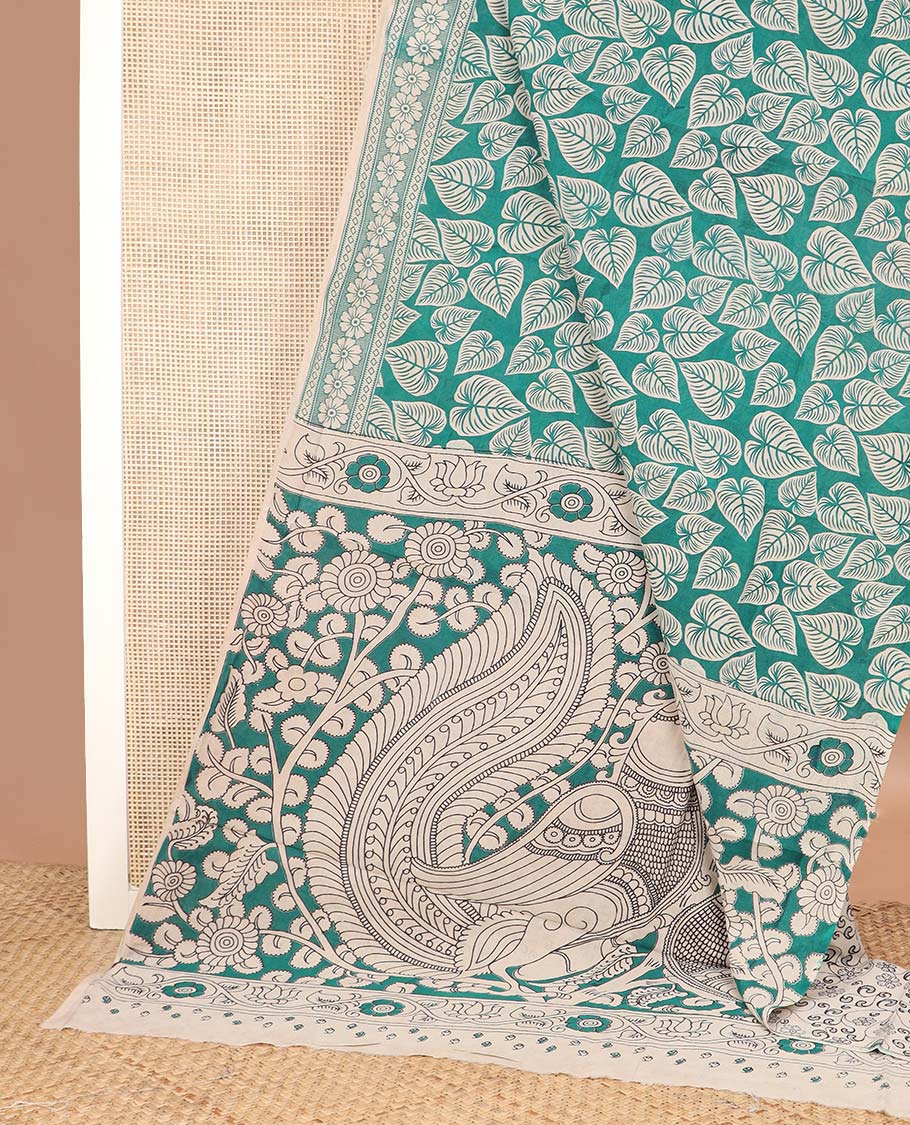 Green leaf machine printed kalamkari cotton saree, floral printed border, and pallu of peacock print