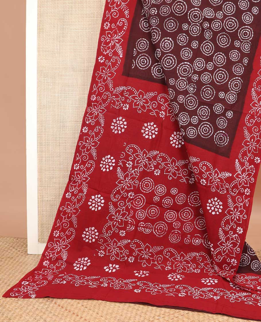 Maroon batik printed sungudi cotton saree, contrast floral batik border, and batik floral pallu