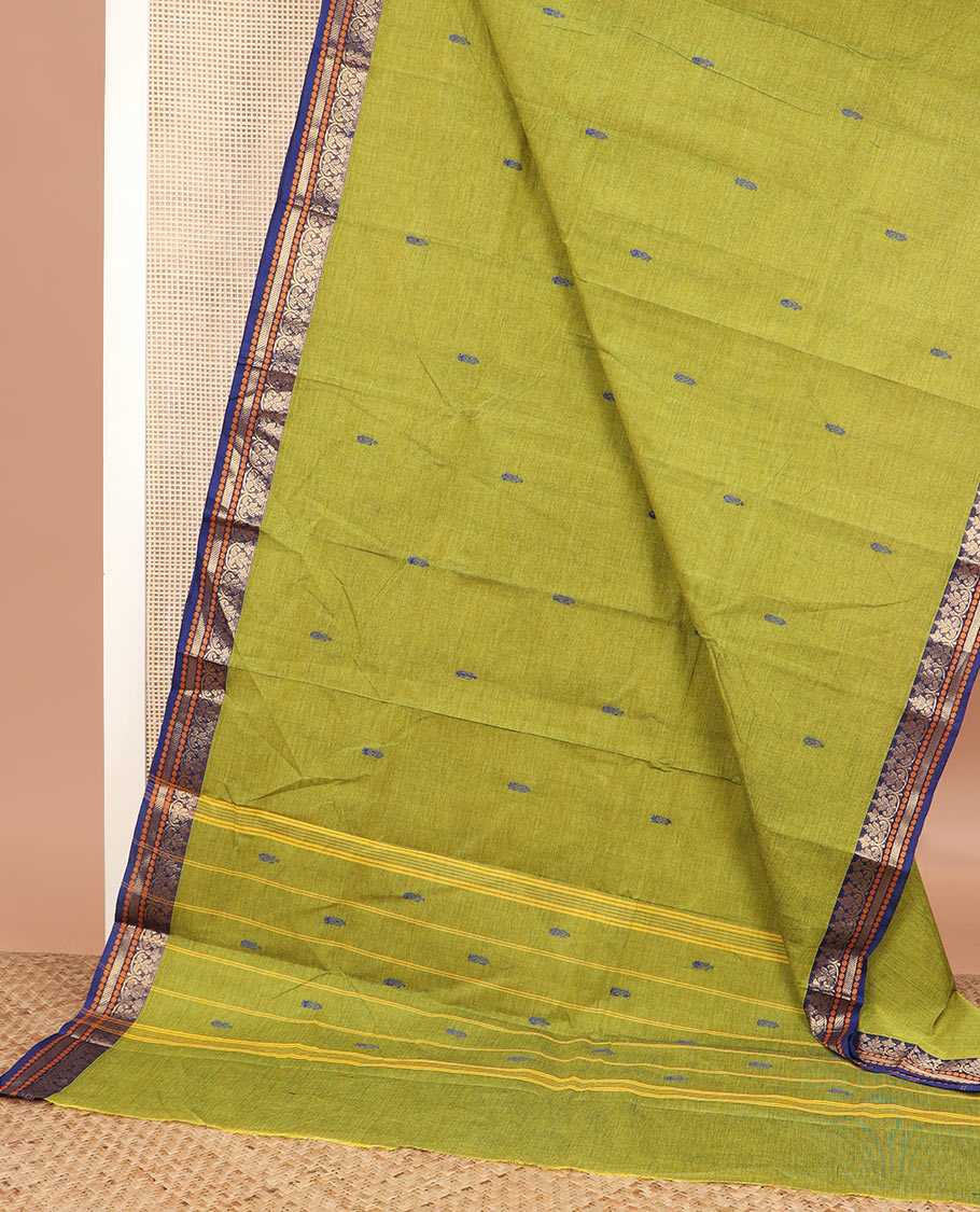 Green buttas Chettinad cotton saree, contrast traditional design border, and striped pallu