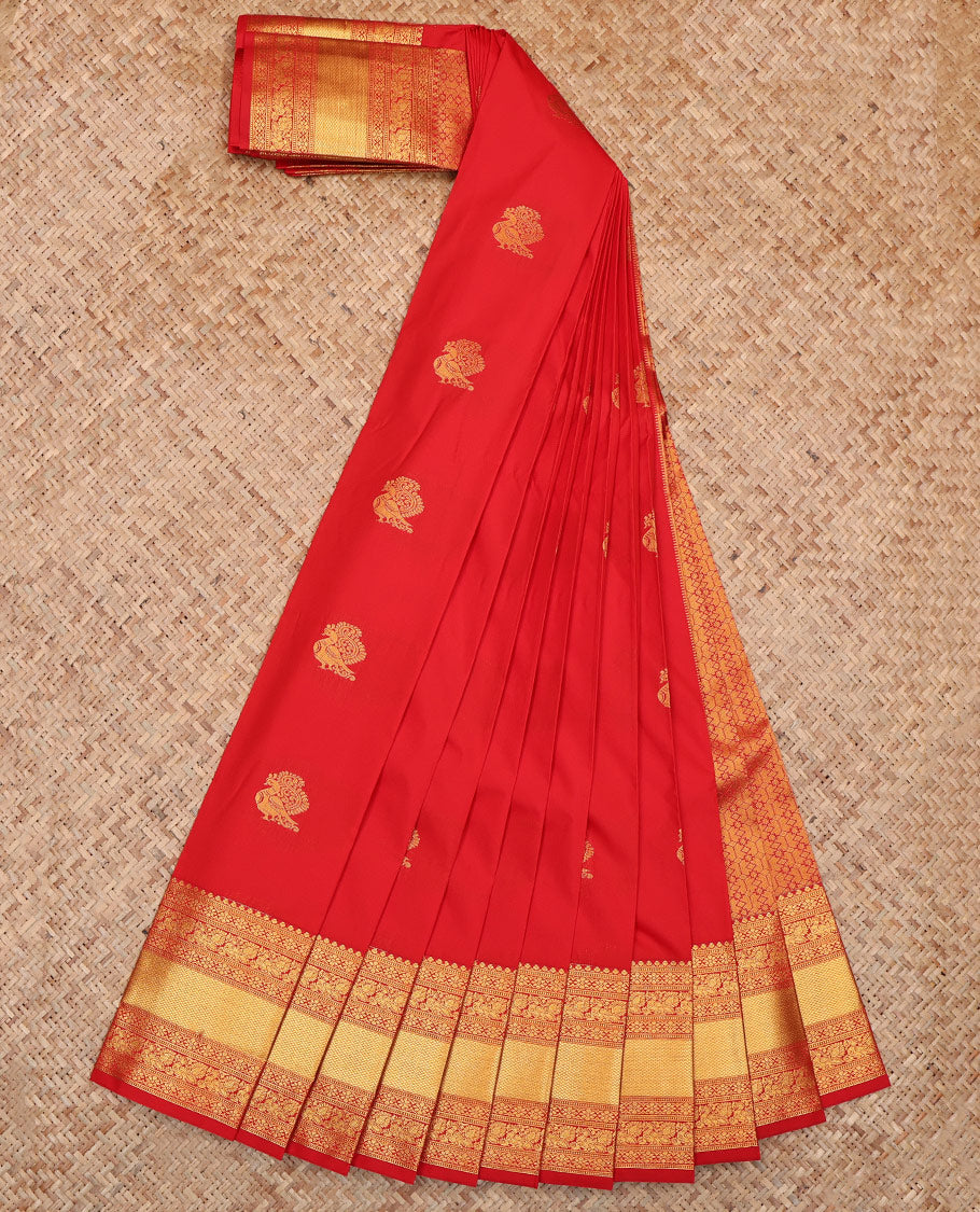 Red Budget Silk Saree, Gleamed Up with Zari Buttas on Its Body, Highlighted by a Zari Border of Traditional Designs, Grand Jaal Design Border, and Paired with a Matching Blouse