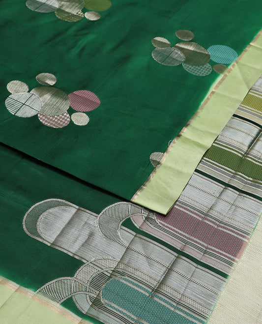 Dark green geometric design raw mango silk saree with contrast border