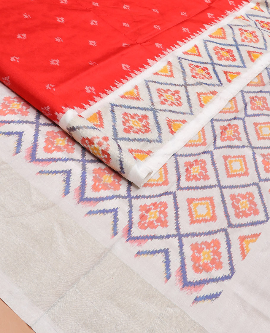 Red Ikkat Silk Saree with Ikkat Buttas, Accentuated with a Contrast Ikkat Jaal-Patterned Border, Pallu Features Ikkat Jaal Patterns, and with a Contrast Blouse