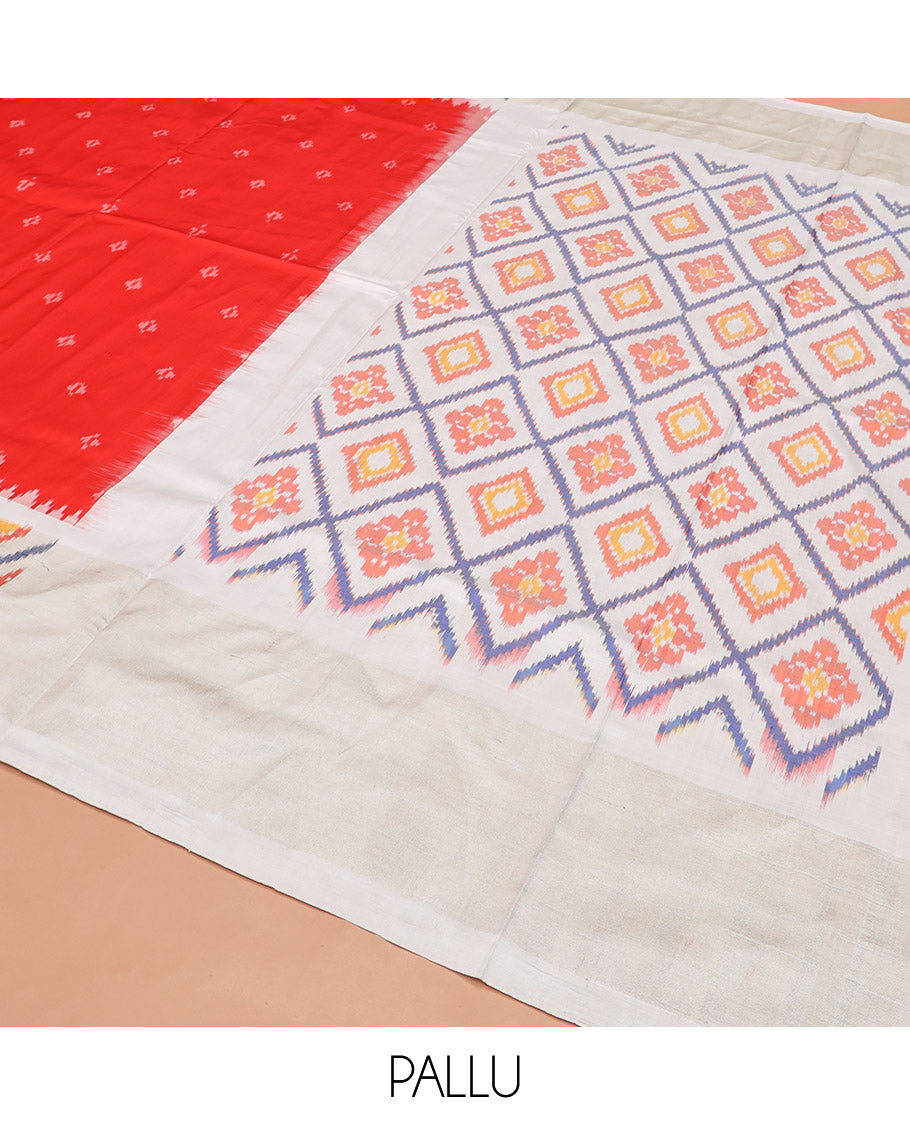 Red Ikkat Silk Saree with Ikkat Buttas, Accentuated with a Contrast Ikkat Jaal-Patterned Border, Pallu Features Ikkat Jaal Patterns, and with a Contrast Blouse