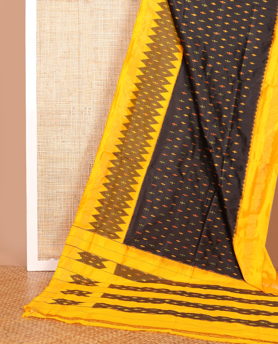Black ikkat saree with ikkat buttas, contrast ikkat border & pallu of ikkat designs
