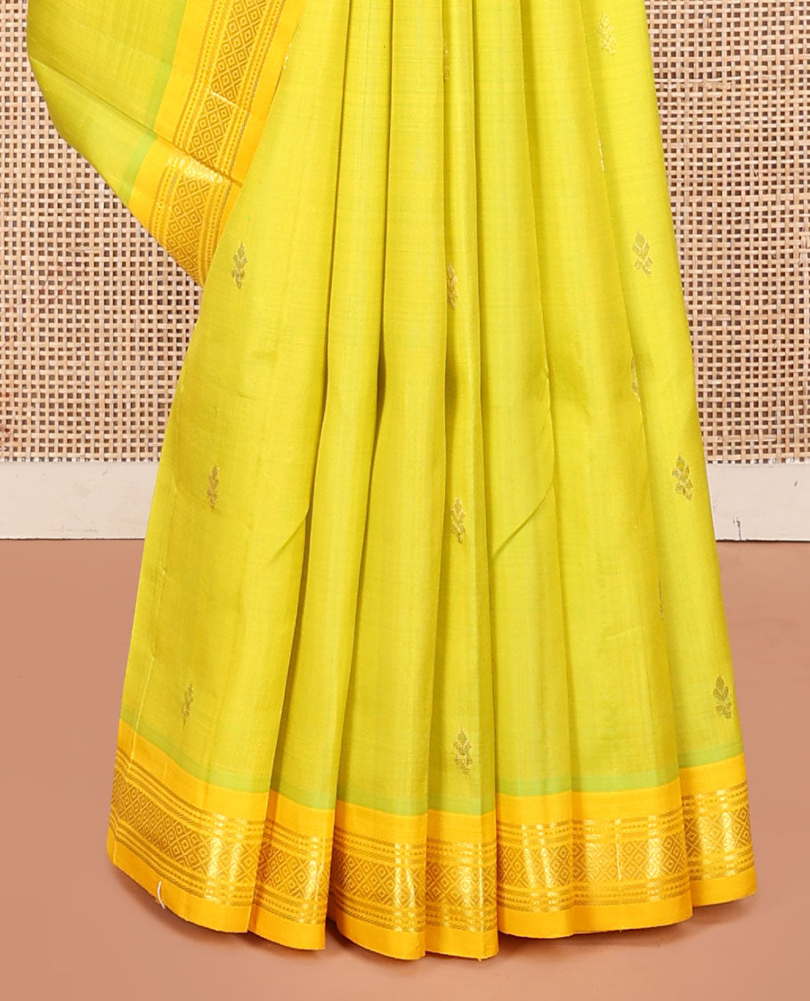 Green Kanchipuram Silk Saree, Accentuated with Zari Buttas, a Contrast One-Sided Border of Banaras, Muthu, and Mayil Kannu, Zari Design Pallu, and No Blouse