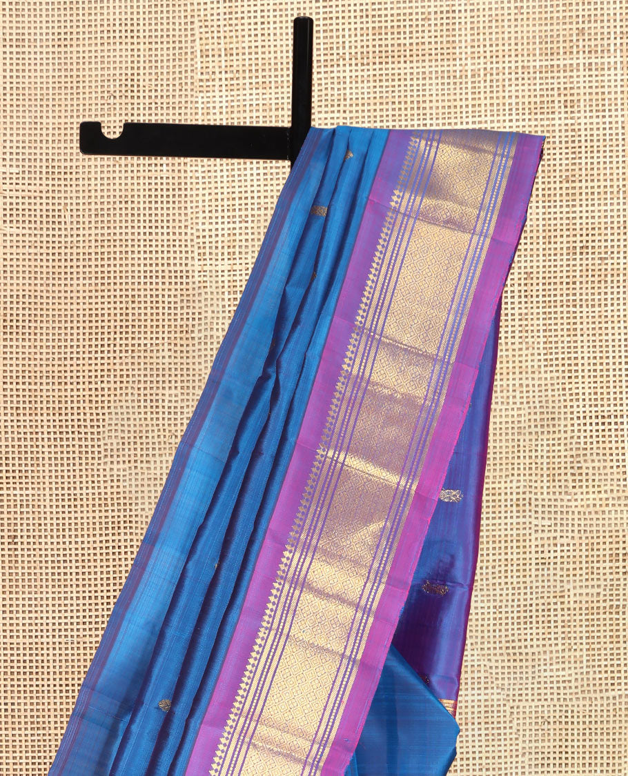 Blue Kanchipuram Silk Saree, Woven with Zari Buttas, a Contrast One-Sided Border of Panner Sombu, Banaras, Muthu, and Jaal Designs, Zari Design Pallu, and a No Blouse