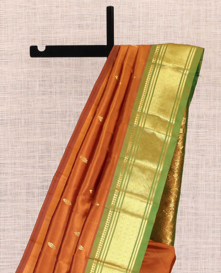 Brown Kanchipuram Silk Saree, Beautified with Zari Buttas, a Contrast One-sided Border of Panner Sombu, Banaras, and Jaal Designs, Pallu of Floral Designs, and No Blouse