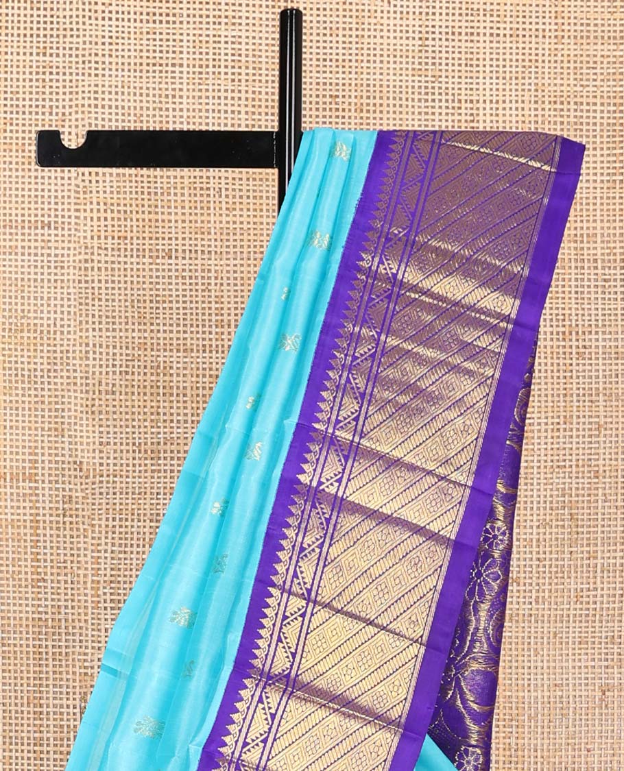 Blue floral design kancheepuram silk saree with contrast border of intricate zari design & floral vine design pallu