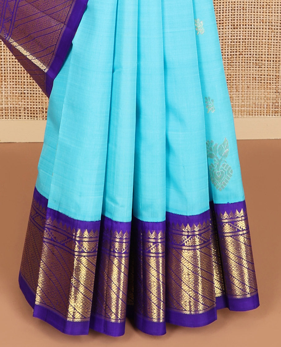 Blue floral design kancheepuram silk saree with contrast border of intricate zari design & floral vine design pallu