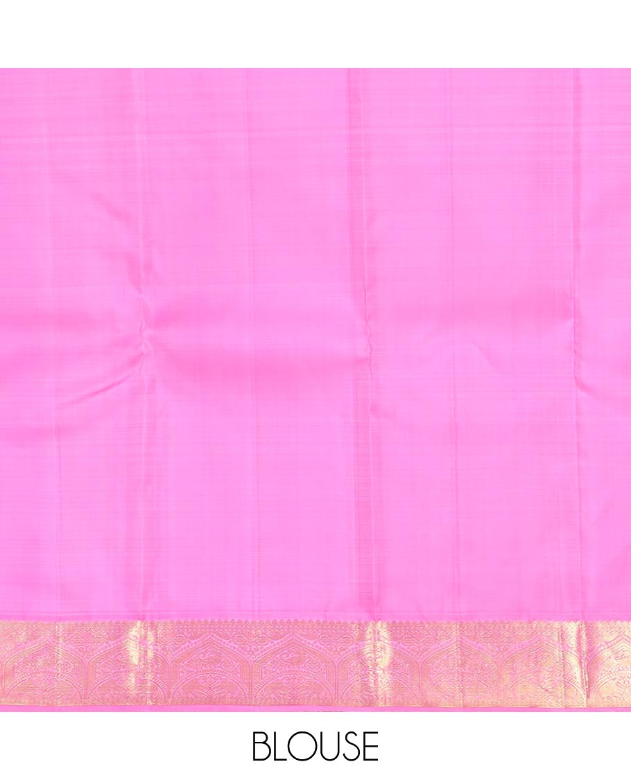 Grey plain Kanchipuram silk saree, contrast korvai zari border, and pallu steeped with traditional designs