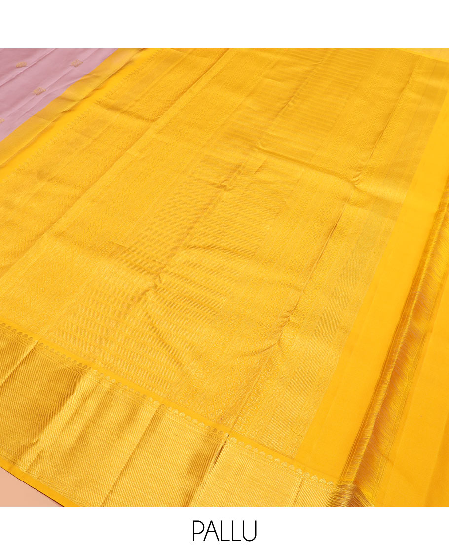 Pink mayil chakram buttas Kanchipuram silk saree, contrast border of thilakam mokku, kathir, and zari stripes, and intricate pallu