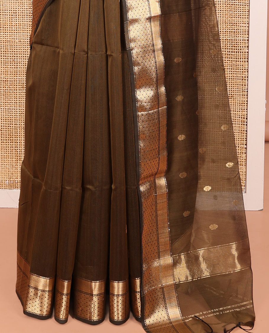 Green Maheshwari Cotton Saree, Decorated with Buttas All Over Its Body, Highlighted by a Zari Traditional Design Border, Pallu Steeped with Buttas, and Paired with a Matching Blouse