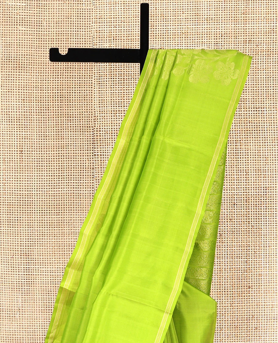Borderless Green Mayuri Lite Silk Mix Saree, Charmingly Accented with Floral Zari Buttas All Over Its Body, Highlighted by a Pallu of Geometric Designs, and Paired with a Matching Blouse