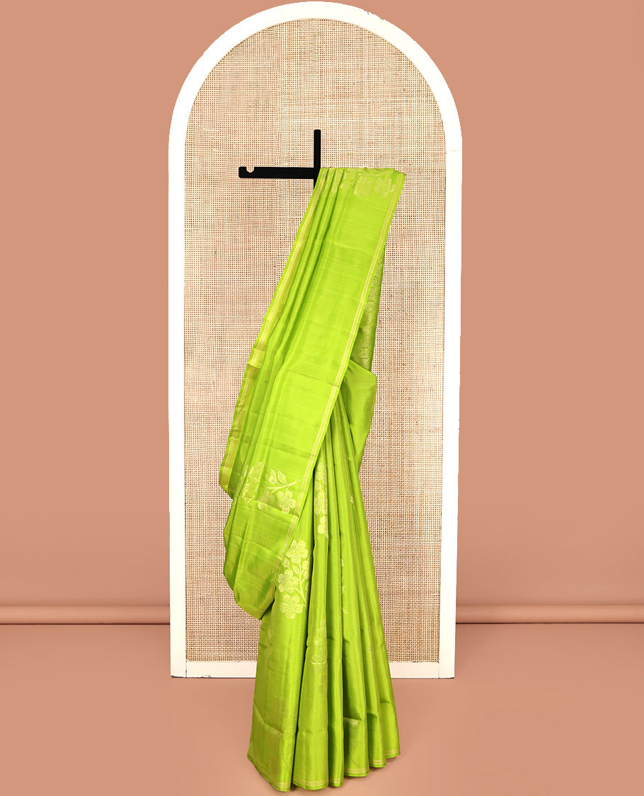 Borderless Green Mayuri Lite Silk Mix Saree, Charmingly Accented with Floral Zari Buttas All Over Its Body, Highlighted by a Pallu of Geometric Designs, and Paired with a Matching Blouse