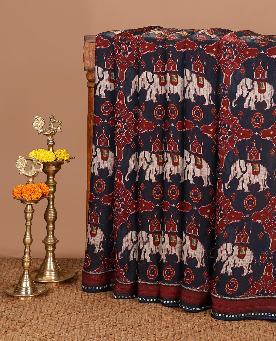 Black pochampally digital printed fendy crepe saree with swarovski stone, lace border & self pallu along with plain blouse