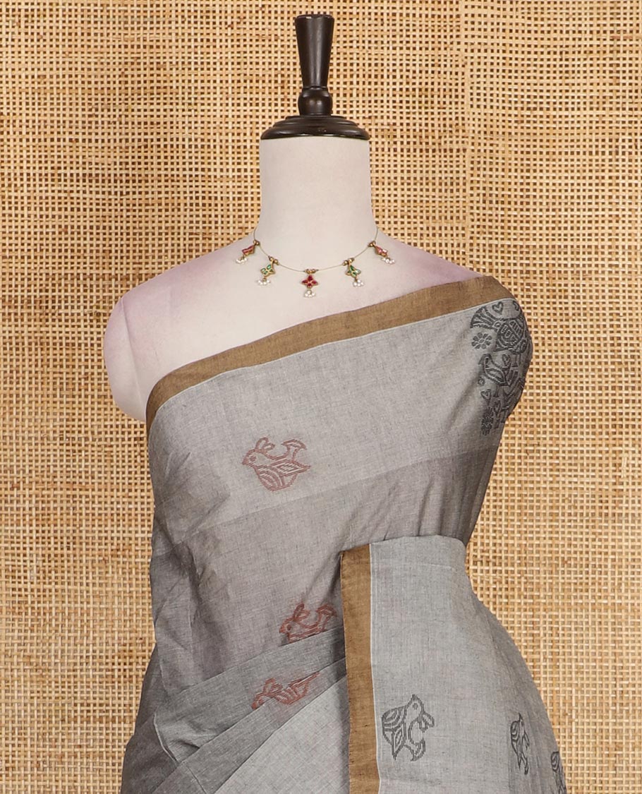 Grey bird motifs printed Handloom cotton saree, contrast piping border, pallu of bird motifs print, and a matching blouse