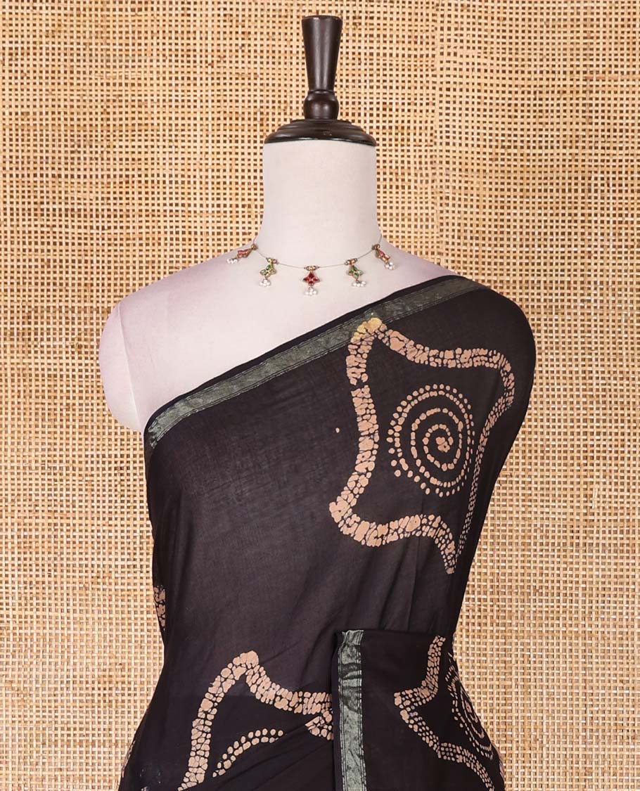 Black-chikku batik geometric printed pure cotton saree, zari piping border, human figurines batik printed pallu, and a matching batik printed blouse